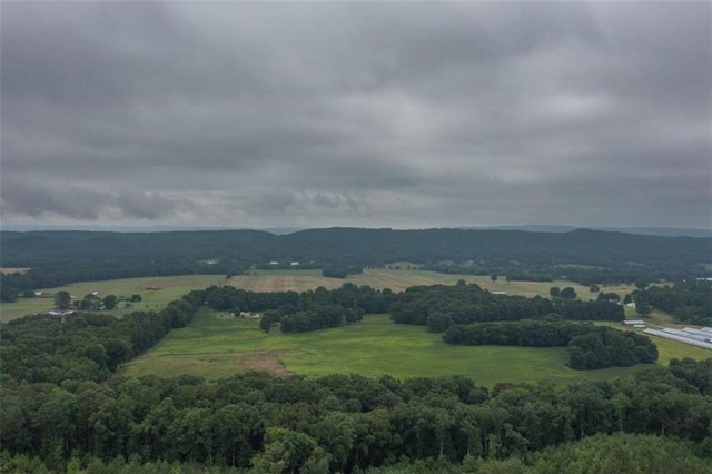 property view of mountains featuring a rural view