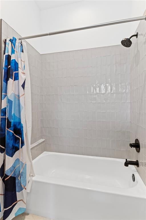 full bathroom with shower / bath combo