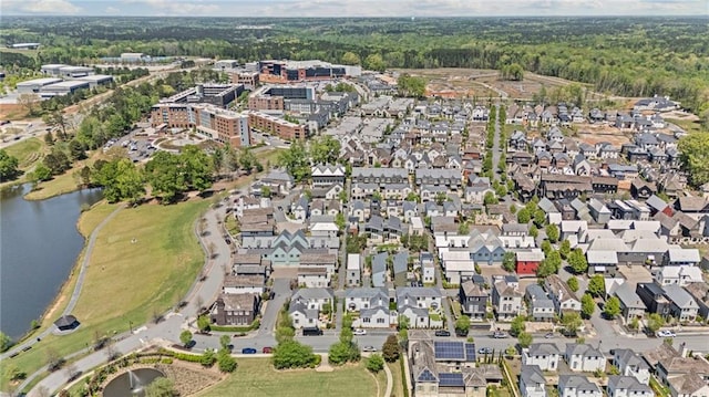 aerial view featuring a water view and a residential view