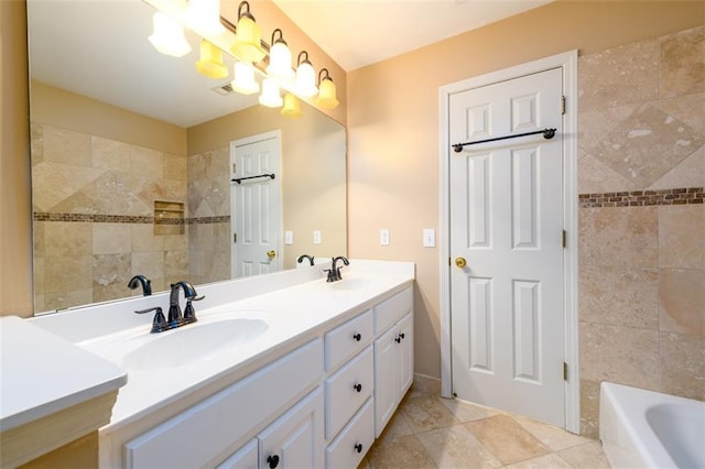 bathroom featuring a tub and vanity