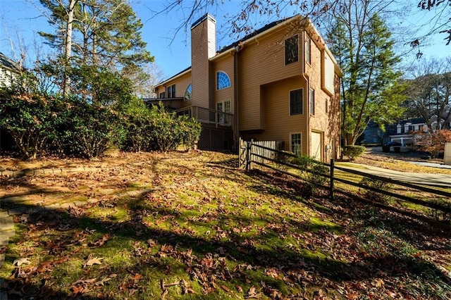 back of property featuring a deck