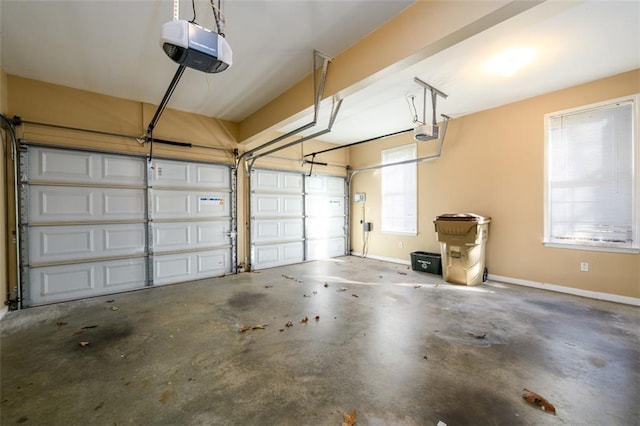 garage featuring a garage door opener