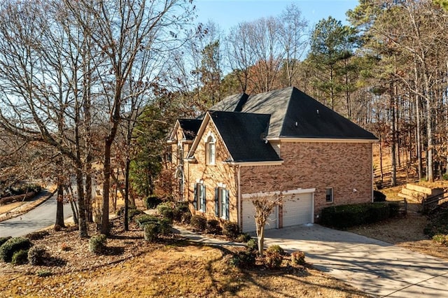 view of property exterior featuring a garage