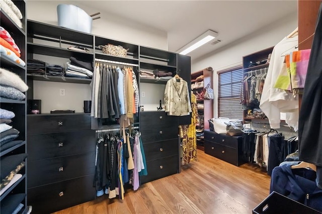 spacious closet with wood finished floors and visible vents