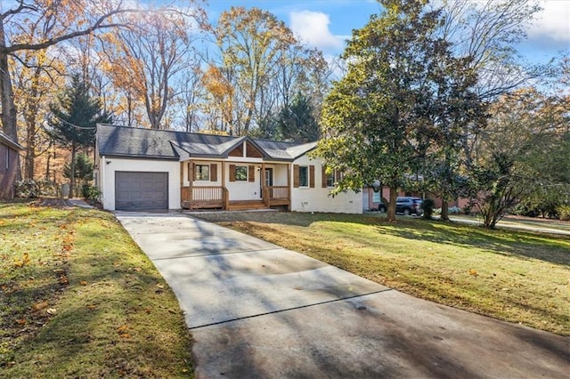 single story home with a garage, covered porch, concrete driveway, stucco siding, and a front lawn