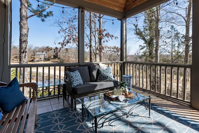 wooden deck featuring outdoor lounge area