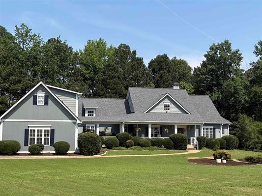 200 Chaparral Trce, Tyrone, GA 30290 - view of front of home featuring a front yard and covered porch