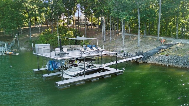 dock area featuring a water view