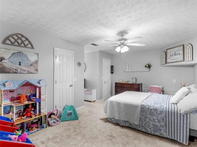 bedroom featuring carpet, a ceiling fan, and baseboards