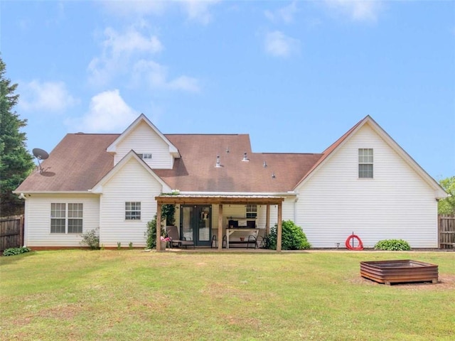 back of house with a patio