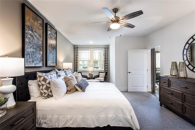 bedroom with ceiling fan and carpet