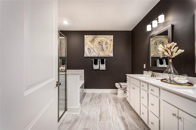 full bathroom with vanity, toilet, and independent shower and bath