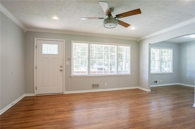 802 San Miguel Dr, Stone Mountain, GA 30083 - entryway featuring wood finished floors, ceiling fan, crown molding, a textured ceiling, and baseboards