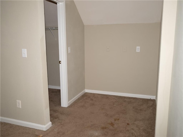 interior space with carpet floors and baseboards