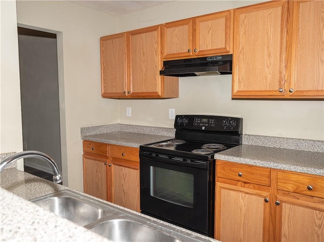 kitchen with under cabinet range hood, light countertops, and black electric range oven