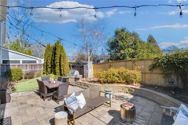 view of patio / terrace featuring a grill