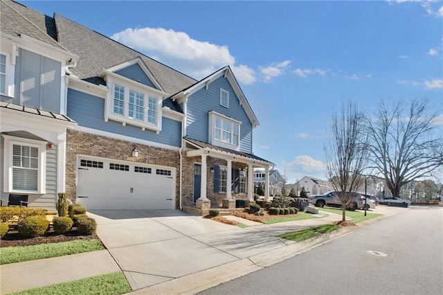 view of front of property featuring a garage