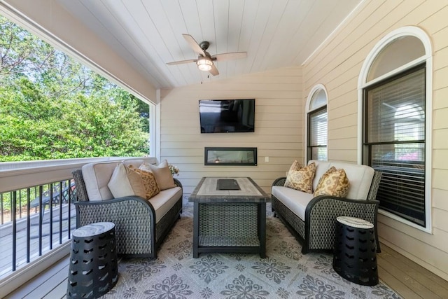 view of patio featuring outdoor lounge area and ceiling fan