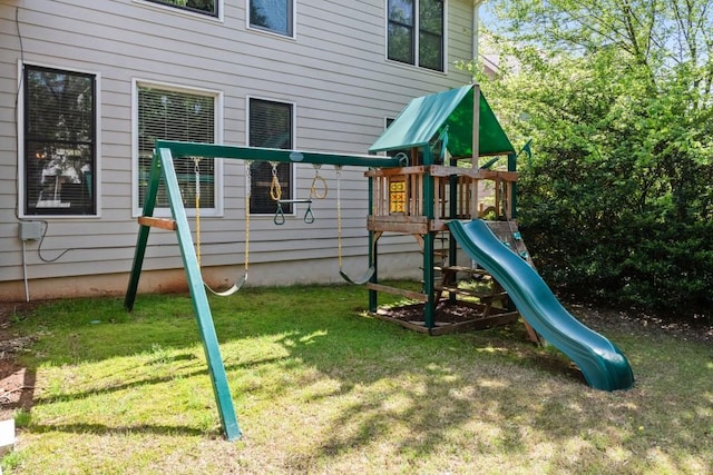 view of playground featuring a lawn