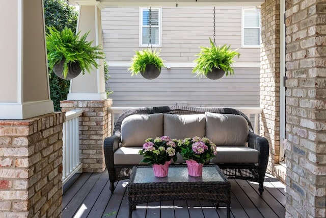 wooden deck with outdoor lounge area
