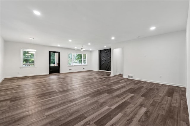 1978 Ethel Ln, Decatur, GA 30032 - unfurnished living room featuring dark wood-type flooring and recessed lighting