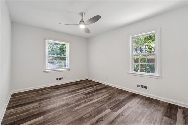 1978 Ethel Ln, Decatur, GA 30032 - spare room featuring healthy amount of natural light, dark wood finished floors, and a ceiling fan