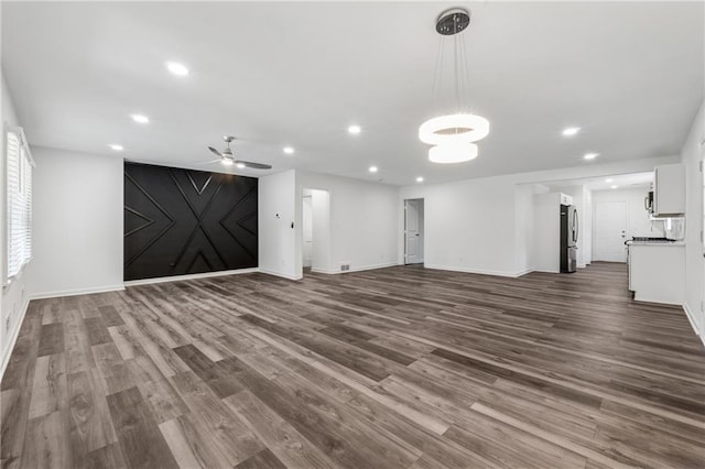 1978 Ethel Ln, Decatur, GA 30032 - unfurnished living room with dark wood finished floors, recessed lighting, and a ceiling fan