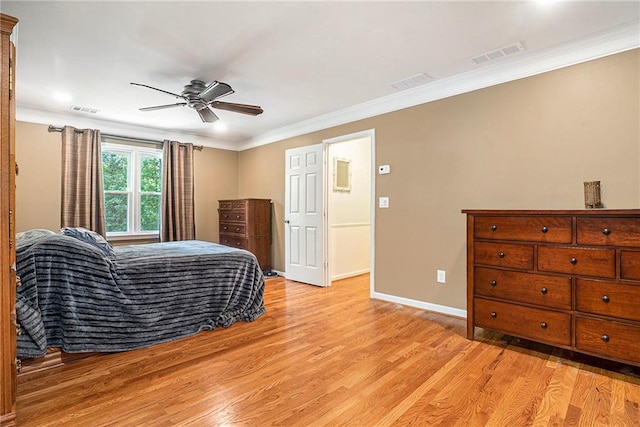 3392 Inns Brook Way, Snellville, GA 30039 - bedroom with light wood-type flooring, crown molding, baseboards, and ceiling fan