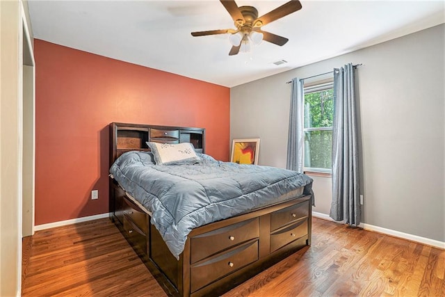 3392 Inns Brook Way, Snellville, GA 30039 - bedroom with baseboards, wood finished floors, and a ceiling fan