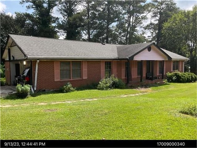 2969 Favor Rd SW, Marietta, GA 30060 - ranch-style home with brick siding and a front yard