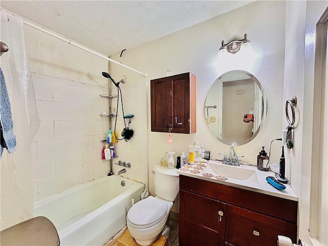 bathroom featuring toilet, shower / washtub combination, a textured ceiling, and vanity