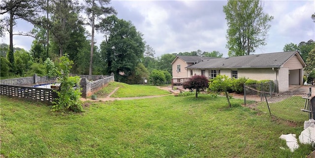 view of yard with a garage