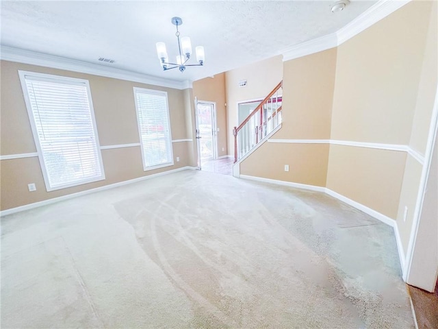unfurnished living room with crown molding, a chandelier, and carpet floors