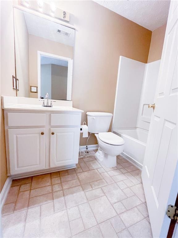 bathroom featuring washtub / shower combination, vanity, toilet, baseboards, and visible vents