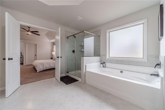 bathroom featuring ceiling fan, independent shower and bath, and tile patterned flooring