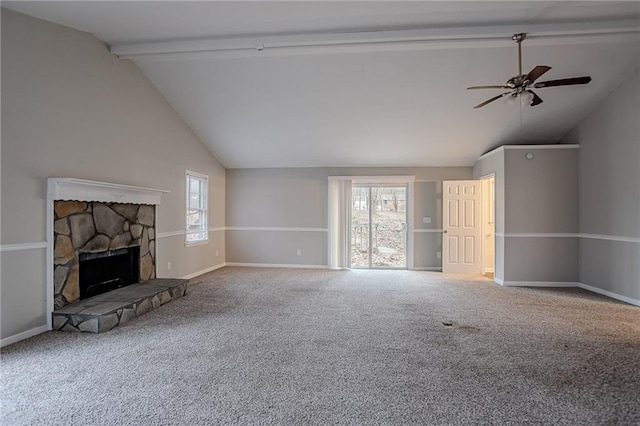 180 Sears Cir, Covington, GA 30016 - unfurnished living room featuring a stone fireplace, high vaulted ceiling, carpet, ceiling fan, and beam ceiling