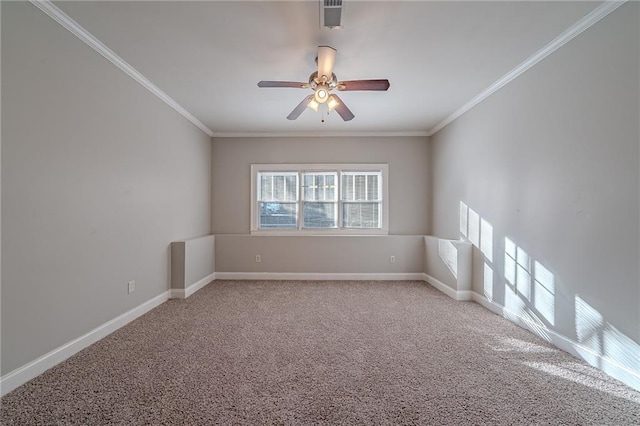 carpeted empty room with ceiling fan and crown molding