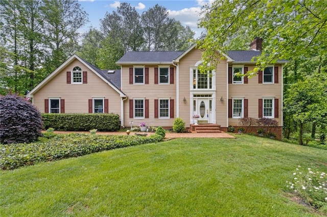 4135 Ashford Way, Gainesville, GA 30507 - colonial home featuring a chimney and a front yard