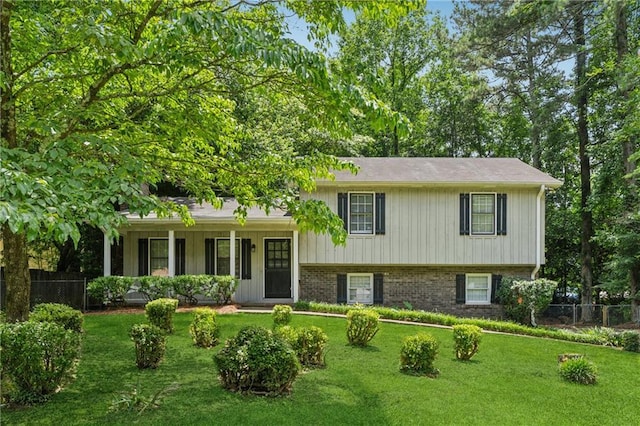 6010 White Oak Ct NW, Kennesaw, GA 31052 - split level home featuring covered porch and brick siding