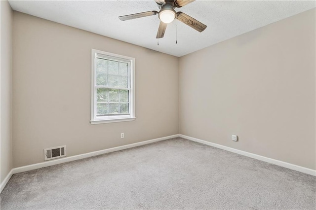 6010 White Oak Ct NW, Kennesaw, GA 31052 - empty room with carpet, a ceiling fan, and a textured ceiling