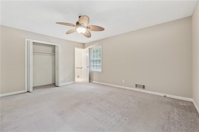 6010 White Oak Ct NW, Kennesaw, GA 31052 - unfurnished bedroom featuring carpet, a closet, ceiling fan, and a textured ceiling