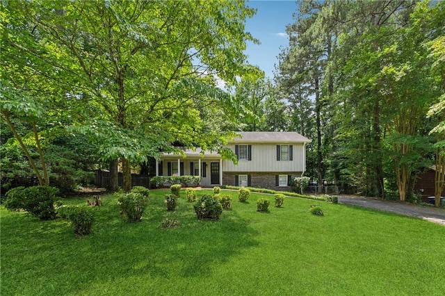 6010 White Oak Ct NW, Kennesaw, GA 31052 - tri-level home featuring a front lawn