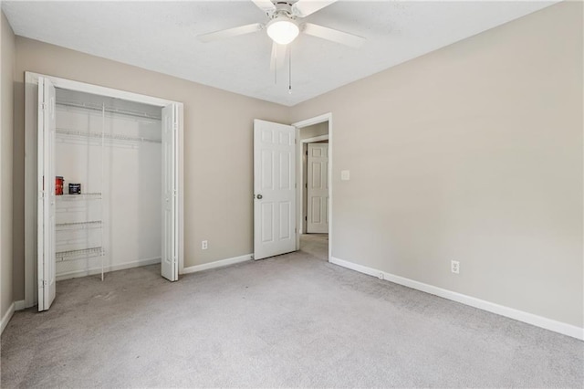 6010 White Oak Ct NW, Kennesaw, GA 31052 - unfurnished bedroom featuring carpet, a closet, and a ceiling fan