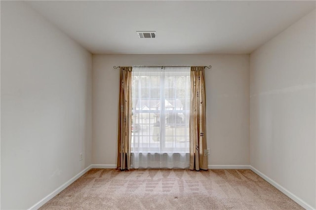 view of carpeted spare room