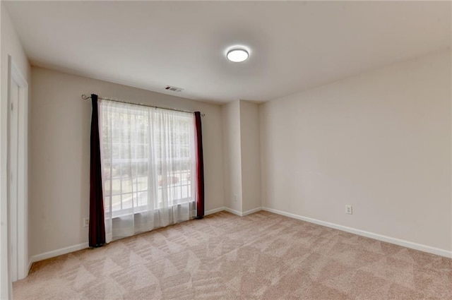 empty room with light carpet