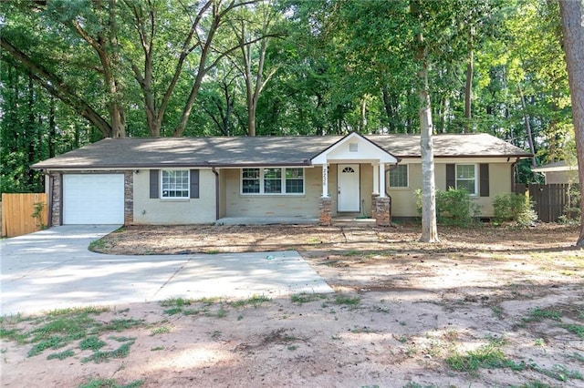 single story home featuring a garage