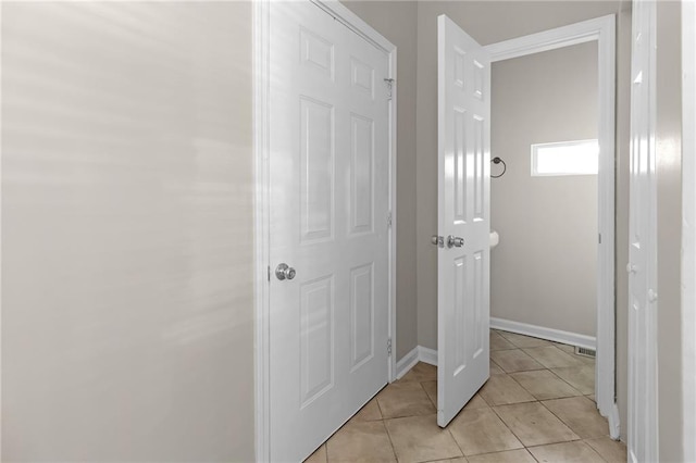 bathroom with tile patterned flooring