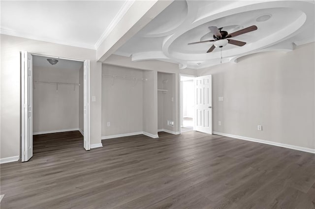 unfurnished bedroom with ceiling fan and dark hardwood / wood-style floors