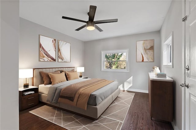 bedroom featuring dark hardwood / wood-style floors and ceiling fan