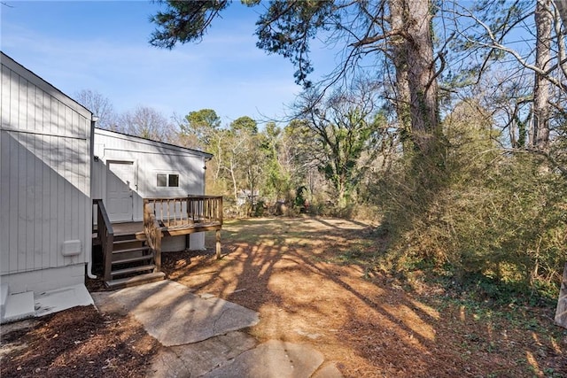 view of yard featuring a deck